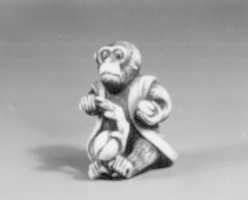 Free download Netsuke in the Shape of a Monkey with a Peach free photo or picture to be edited with GIMP online image editor