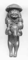 Free download Netsuke of Boy Sitting on the Shoulders of an Animal free photo or picture to be edited with GIMP online image editor