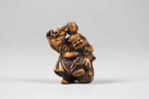 Free download Netsuke of Daikoku and Mallet on Bale free photo or picture to be edited with GIMP online image editor