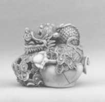 Free download Netsuke of Dragon in Foam Coming out of a Jar free photo or picture to be edited with GIMP online image editor