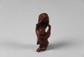 Free download Netsuke of Ghost and Man on His Knees free photo or picture to be edited with GIMP online image editor