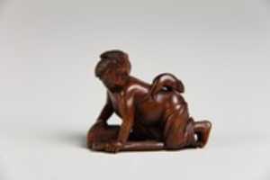 Free download Netsuke of Girl with a Mouse on her Back free photo or picture to be edited with GIMP online image editor