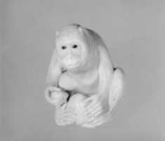 Free download Netsuke of Seated Monkey with Persimmon free photo or picture to be edited with GIMP online image editor