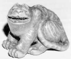 Free download Netsuke of Seated Tiger with Tail Curled beside Him free photo or picture to be edited with GIMP online image editor