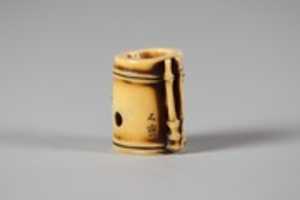 Free download Netsuke of Section of Bamboo Containing Two Men free photo or picture to be edited with GIMP online image editor