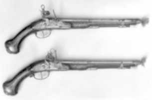 Free download Pair of Pistols with Flintlocks a la moda free photo or picture to be edited with GIMP online image editor