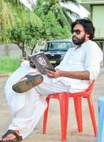 Free download Pawan Kalyan Reading Janavamsham by Seshendra free photo or picture to be edited with GIMP online image editor