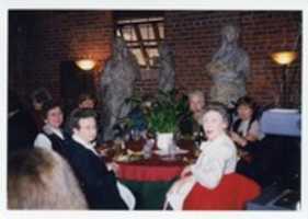 Free download Photograph, AAUW Meeting on Childcare, February 1999, Women Seated at Table with Statues in the Background free photo or picture to be edited with GIMP online image editor