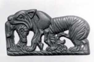 Free download Plaque with tiger devouring ram free photo or picture to be edited with GIMP online image editor