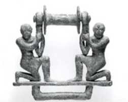 Free download Plaque with two male figures supporting a roller free photo or picture to be edited with GIMP online image editor