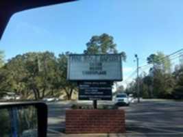 Free download Satan Wears Camouflage Pine Ridge Baptist Church Marquee Sign in Brunswick, Georgia in March of 2019 free photo or picture to be edited with GIMP online image editor