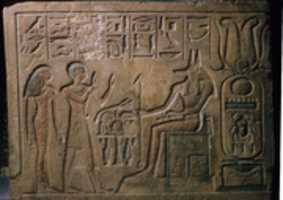 Free download Stela of Siamun and Taruy worshipping Anubis free photo or picture to be edited with GIMP online image editor