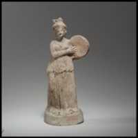 Free download Terracotta statuette of woman playing a tympanon free photo or picture to be edited with GIMP online image editor