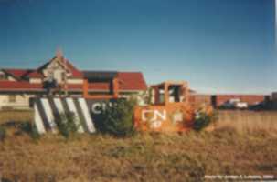 Free download Train Fort, Facing South Behind Railroad Station, Hanna Summer 2002 free photo or picture to be edited with GIMP online image editor