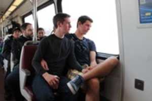 Free download Two Gay Men on DC Subway Train - Photo free photo or picture to be edited with GIMP online image editor