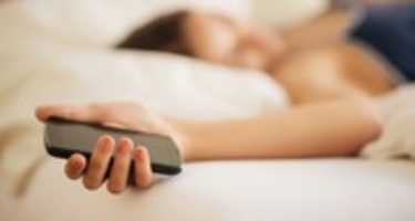 Free download woman-sleeping-with-cell-phone-620x330 free photo or picture to be edited with GIMP online image editor