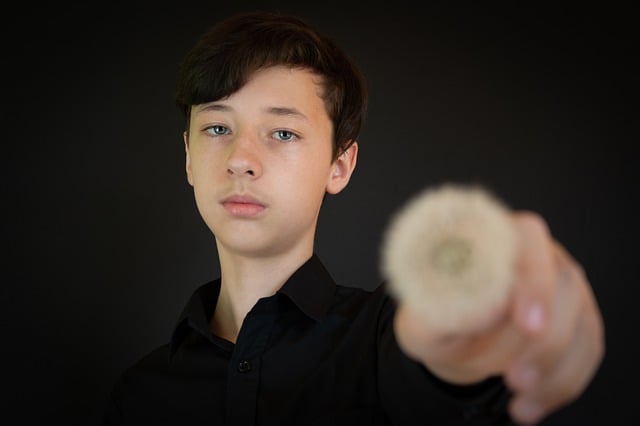 Free download young man boy teen hand dandelion free picture to be edited with GIMP free online image editor