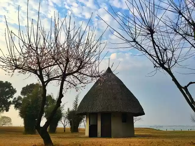 Free download Blue Sky Thatched Cottage -  free photo or picture to be edited with GIMP online image editor