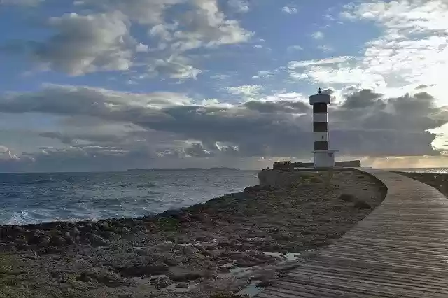 Free download Lighthouse Mallorca Clouds -  free free photo or picture to be edited with GIMP online image editor