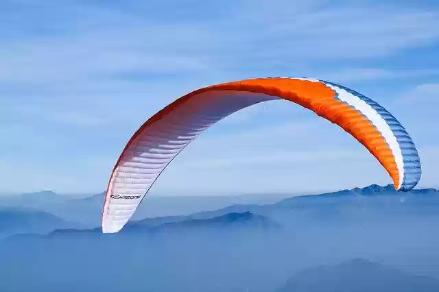 Free download Paragliding Sky Mountains -  free photo or picture to be edited with GIMP online image editor