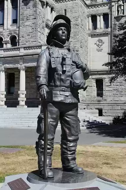 Free download Statue Bronze Fireman British -  free photo or picture to be edited with GIMP online image editor